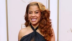 Keyshia-Cole-Appears-To-Cover-Up-Chest-Tattoo-Of-Hunxho-First-Name.jpg