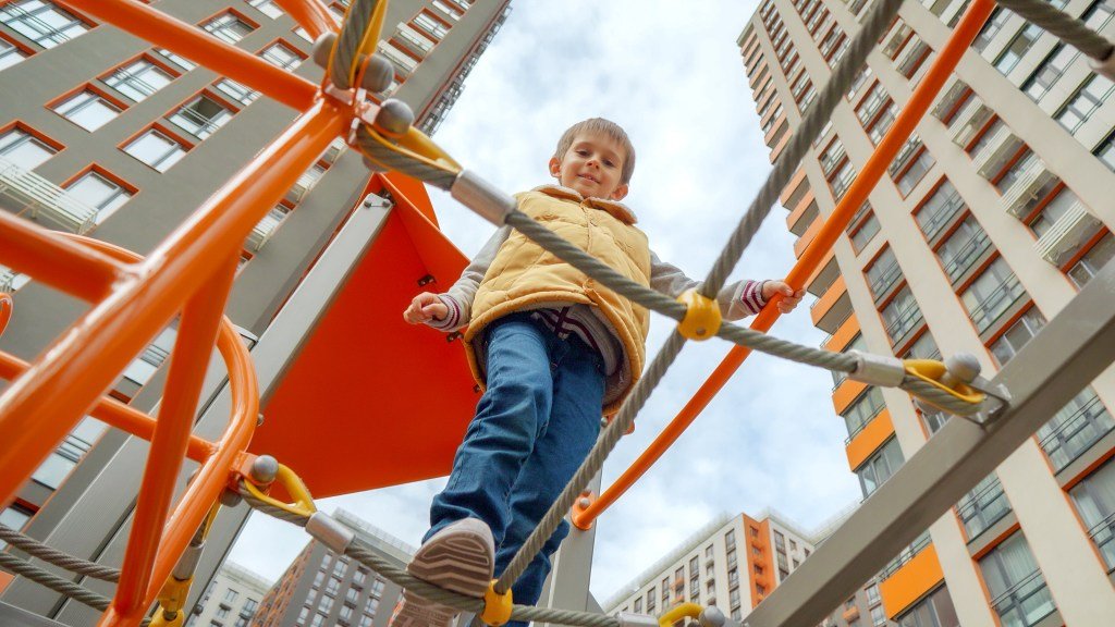 smiling-boy-looking-down-while-crossing-the-rope-b-2025-01-07-09-48-52-utc.jpg