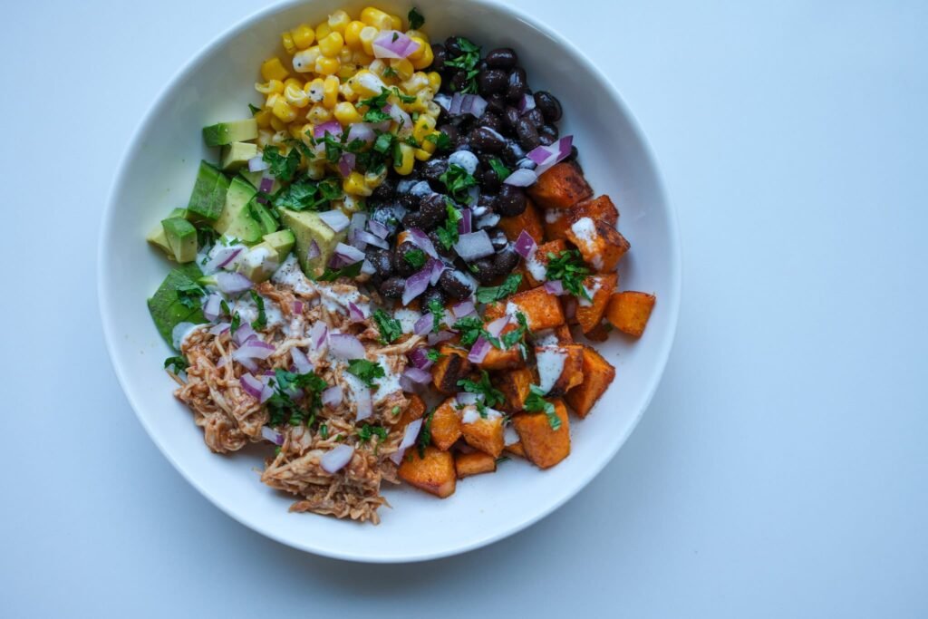BBQ-Chicken-Sweet-Potato-Bowls-with-avocado-black-beans-corn-cilantro-and-ranch-drizzle-7.jpg