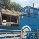 A brand new ice cream and occasional store simply opened — inside a caboose