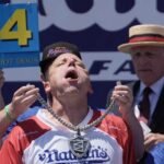 Joey Chestnut eats 66 scorching canines to once more declare Mustard Belt