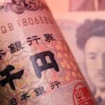 Yen edges up as merchants push again Fed fee hike bets