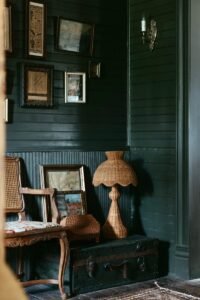 vintage-farmhouse-with-deep-green-walls-and-rattan-michelle.jpg